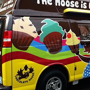 Closeup of right side of the Chocolate Moose cupcake delivery van Greenville SC