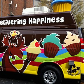 Left side of the Chocolate Moose cupcake delivery van Greenville SC